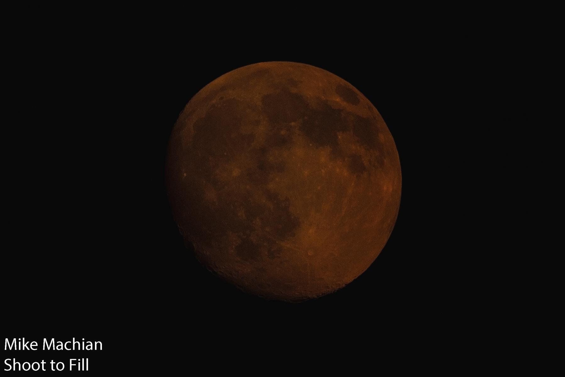 Moon reddened by the wildfire haze
